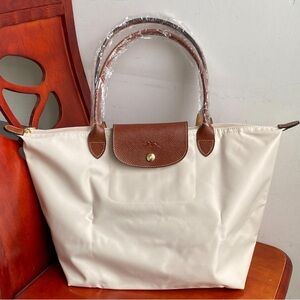 Longchamp Cream Tote with Brown Leather Trim and Handles